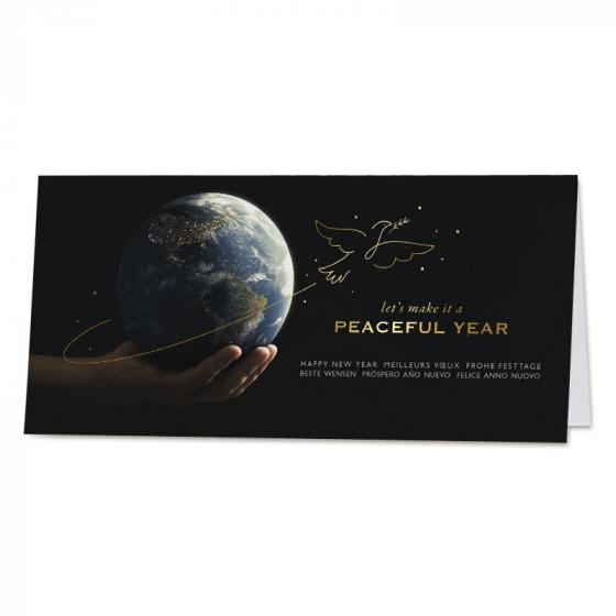 Zakelijke kerstkaart wereldbol in de hand