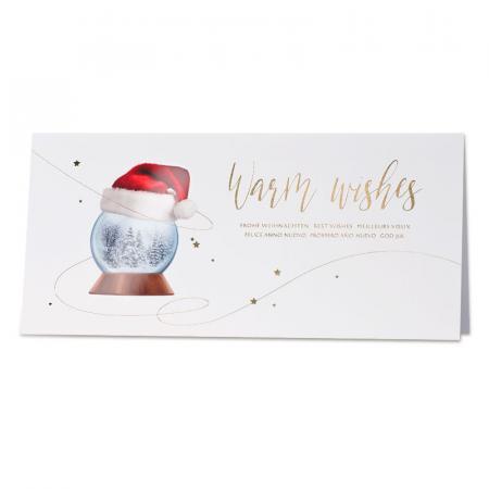 Kerstkaart met sneeuwbol en kerstmuts