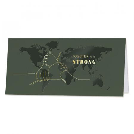 Moderne kerstkaart met slogan en wereldkaart